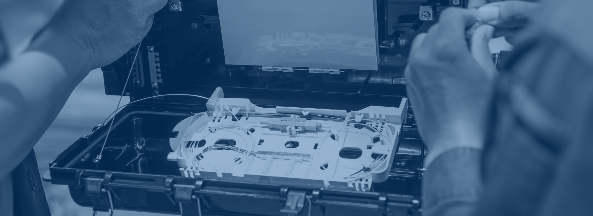 Person working on a cable box